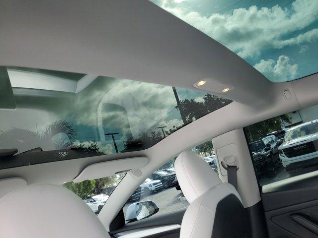 used 2023 Tesla Model 3 car, priced at $25,985