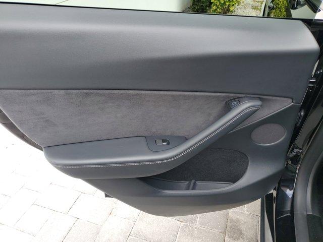 used 2024 Tesla Model Y car, priced at $31,912