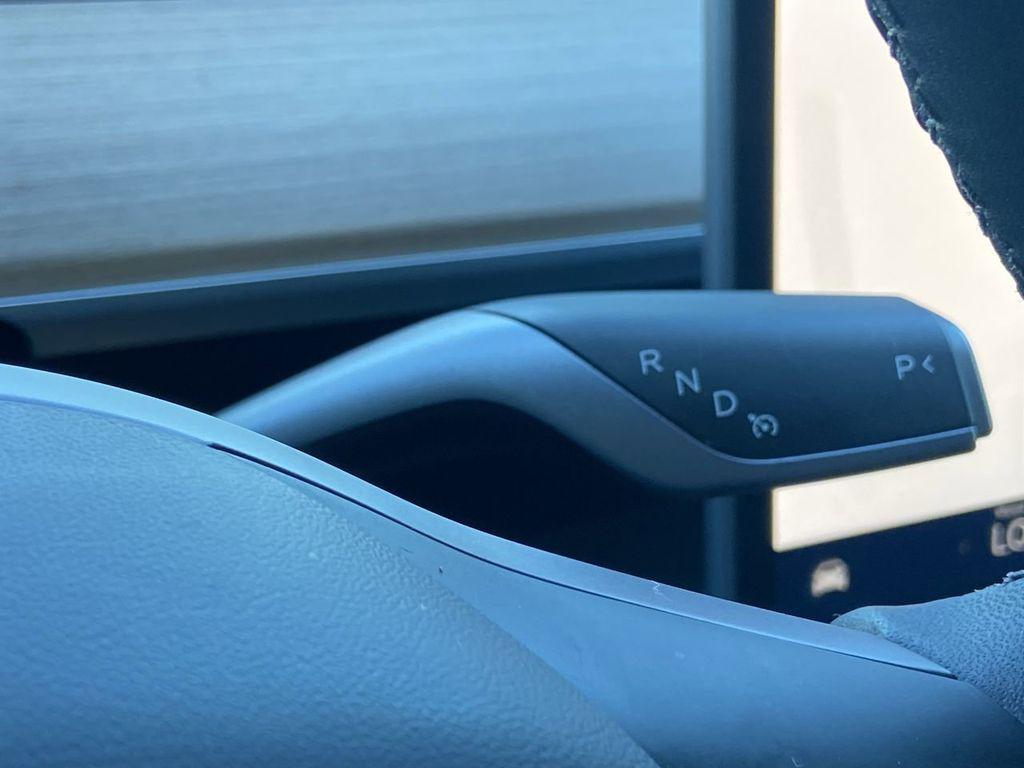 used 2025 Tesla Model Y car, priced at $42,996