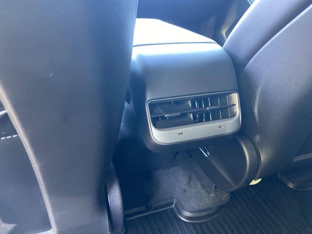 used 2025 Tesla Model Y car, priced at $42,996