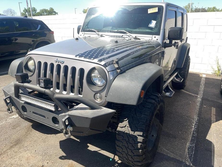 used 2014 Jeep Wrangler Unlimited car, priced at $19,359