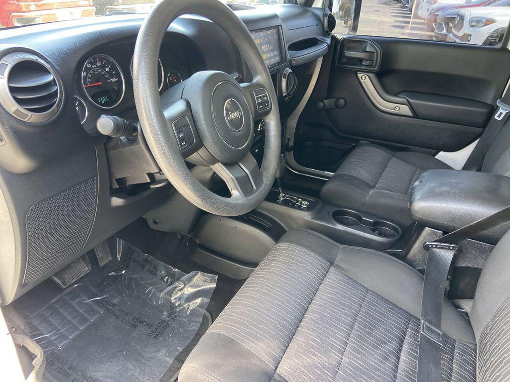 used 2012 Jeep Wrangler Unlimited car, priced at $14,996