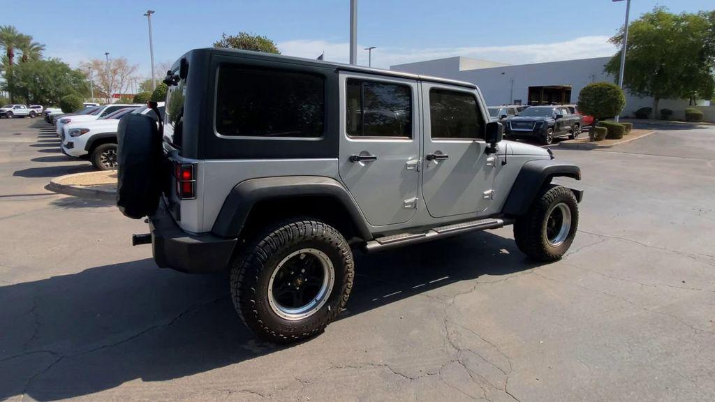 used 2012 Jeep Wrangler Unlimited car, priced at $14,996