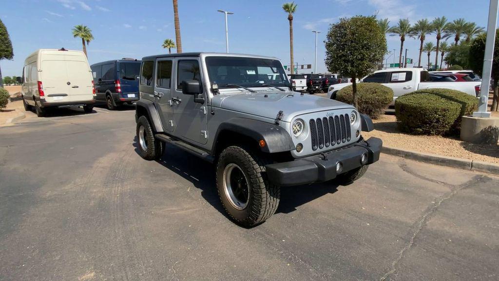 used 2012 Jeep Wrangler Unlimited car, priced at $14,996
