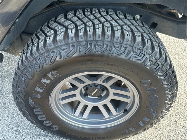 used 2014 Jeep Wrangler Unlimited car, priced at $21,880