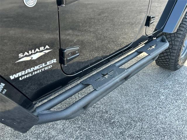 used 2014 Jeep Wrangler Unlimited car, priced at $21,880