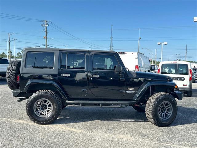 used 2014 Jeep Wrangler Unlimited car, priced at $21,880