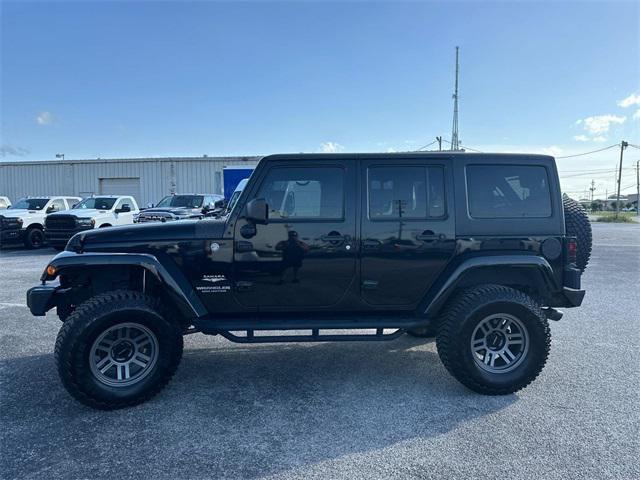 used 2014 Jeep Wrangler Unlimited car, priced at $21,880