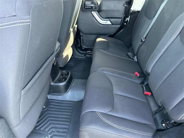 used 2014 Jeep Wrangler Unlimited car, priced at $21,880