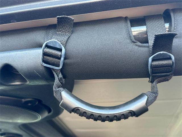 used 2014 Jeep Wrangler Unlimited car, priced at $21,880