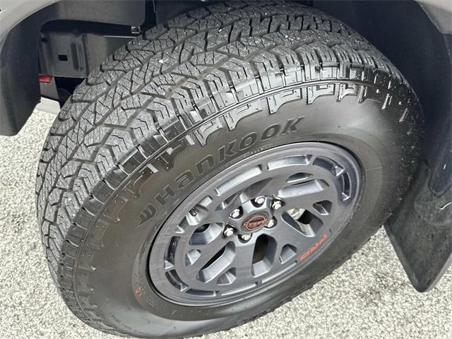 used 2025 Nissan Frontier car, priced at $44,950