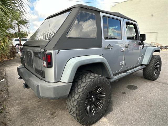 used 2014 Jeep Wrangler Unlimited car, priced at $17,750