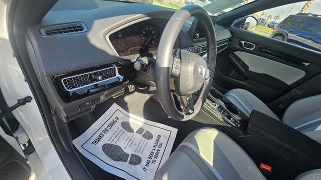 used 2025 Honda Civic Hybrid car, priced at $29,999