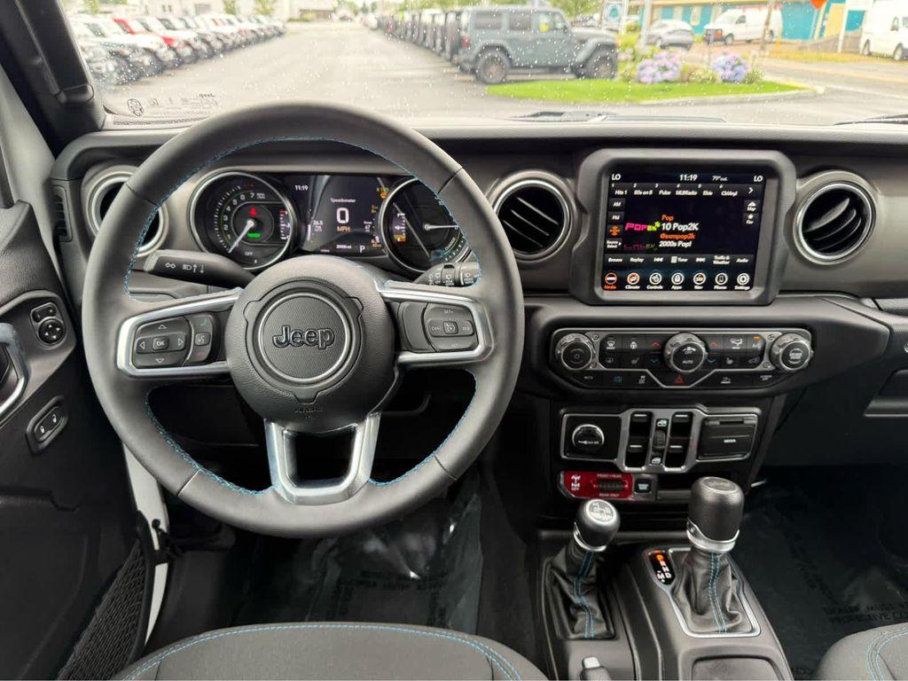 used 2023 Jeep Wrangler 4xe car, priced at $35,575