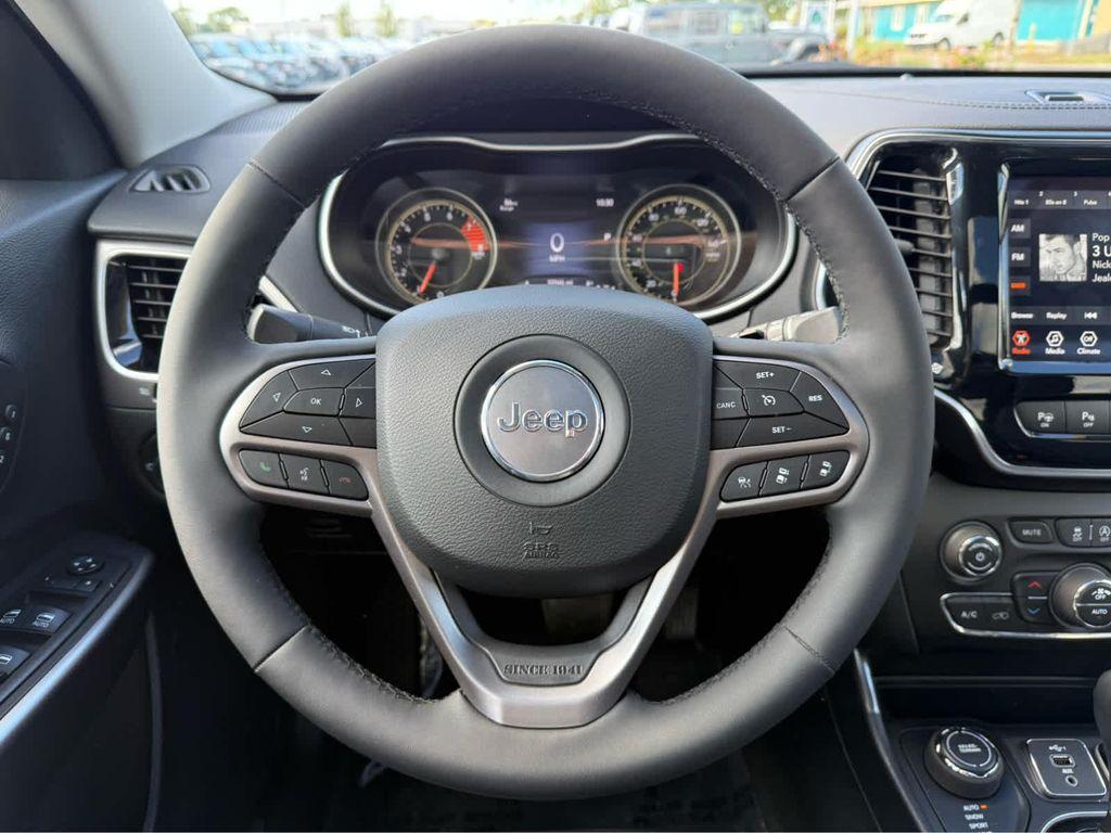 used 2021 Jeep Cherokee car, priced at $22,975