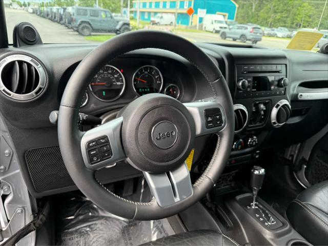 used 2014 Jeep Wrangler Unlimited car, priced at $17,575