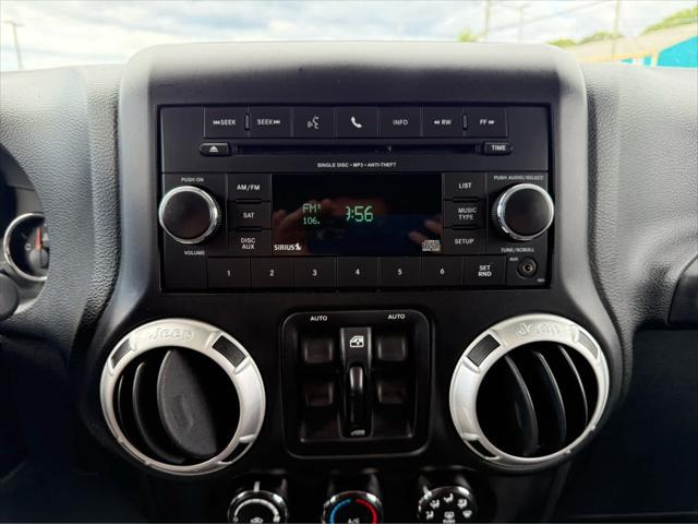 used 2014 Jeep Wrangler Unlimited car, priced at $17,575