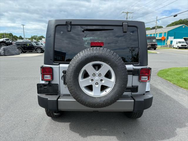 used 2014 Jeep Wrangler Unlimited car, priced at $17,575