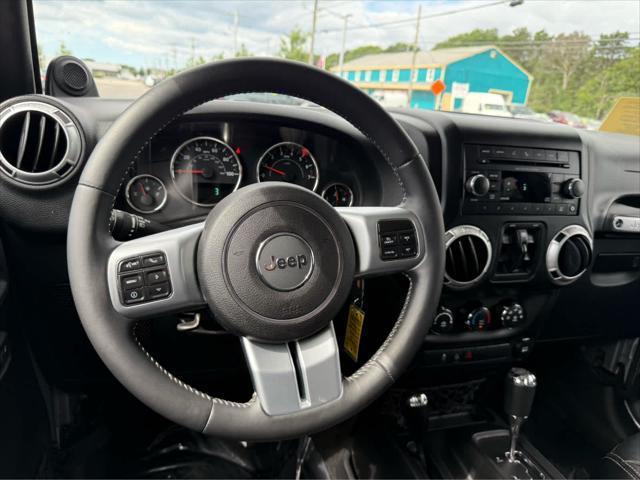 used 2014 Jeep Wrangler Unlimited car, priced at $17,575