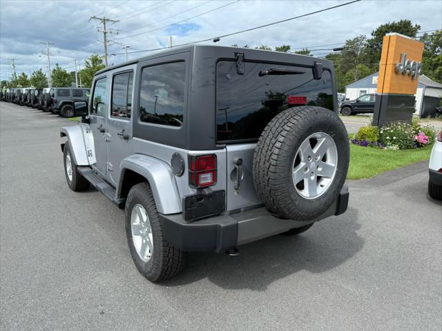 used 2014 Jeep Wrangler Unlimited car, priced at $17,575