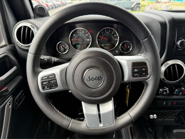 used 2014 Jeep Wrangler Unlimited car, priced at $17,575