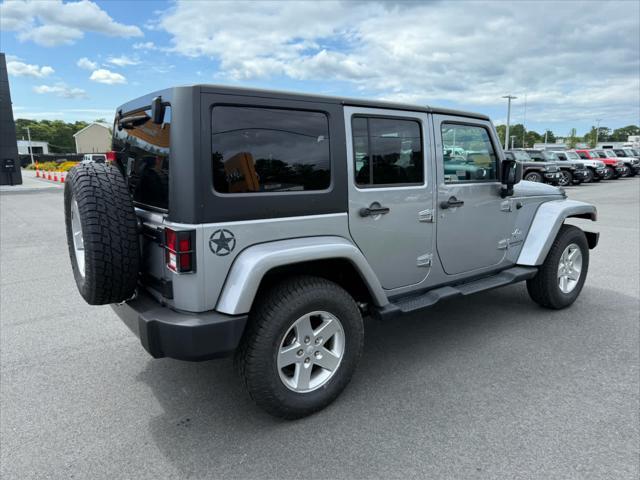 used 2014 Jeep Wrangler Unlimited car, priced at $17,575