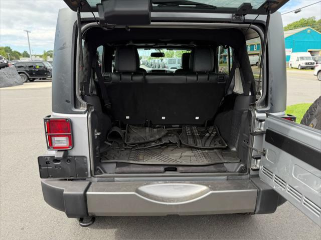 used 2014 Jeep Wrangler Unlimited car, priced at $17,575