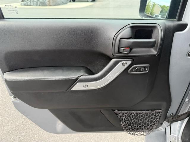 used 2014 Jeep Wrangler Unlimited car, priced at $17,575