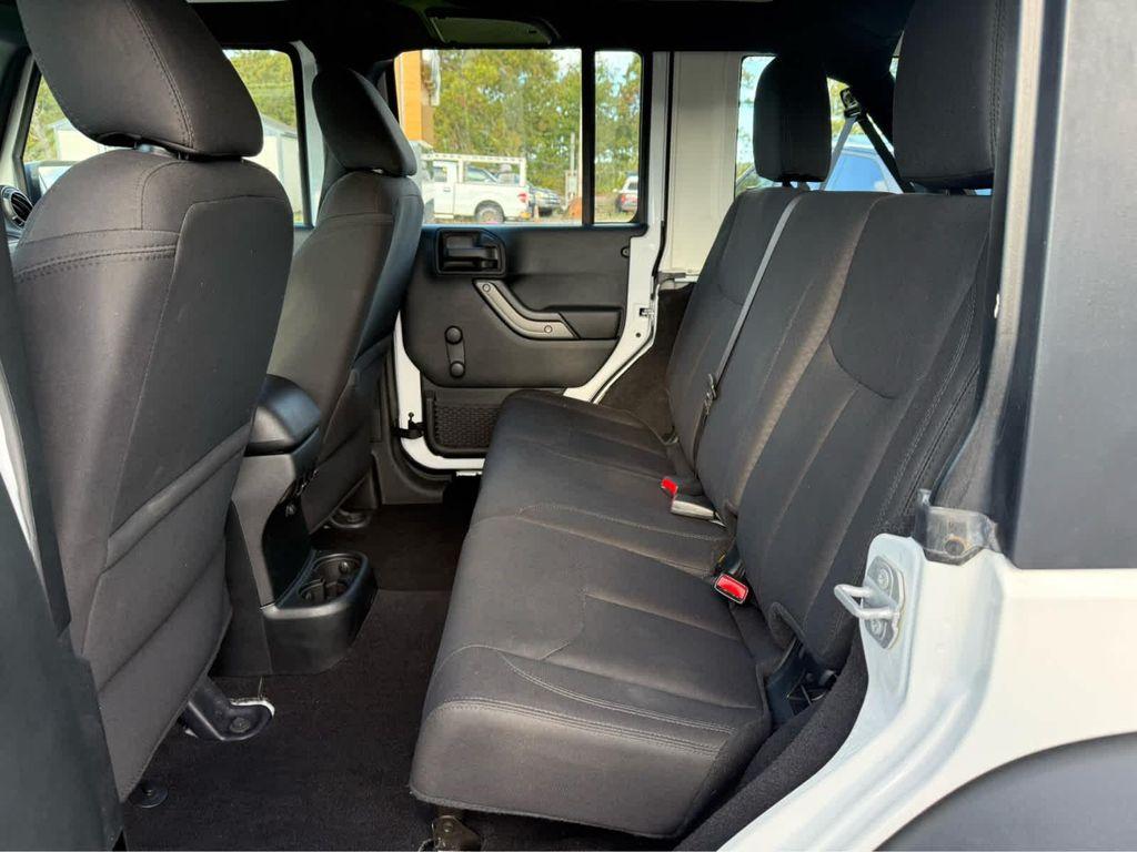 used 2018 Jeep Wrangler JK Unlimited car, priced at $23,975