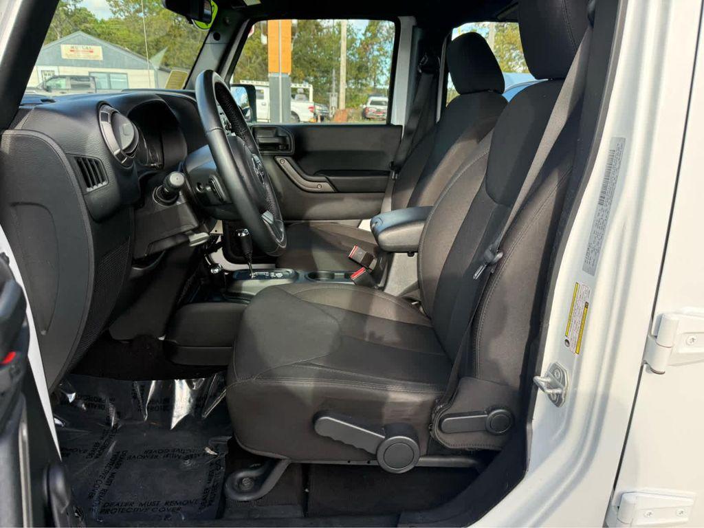 used 2018 Jeep Wrangler JK Unlimited car, priced at $23,975