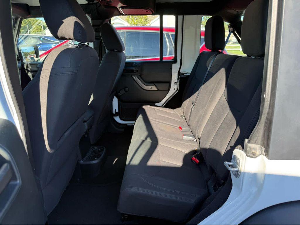 used 2018 Jeep Wrangler JK Unlimited car, priced at $25,975