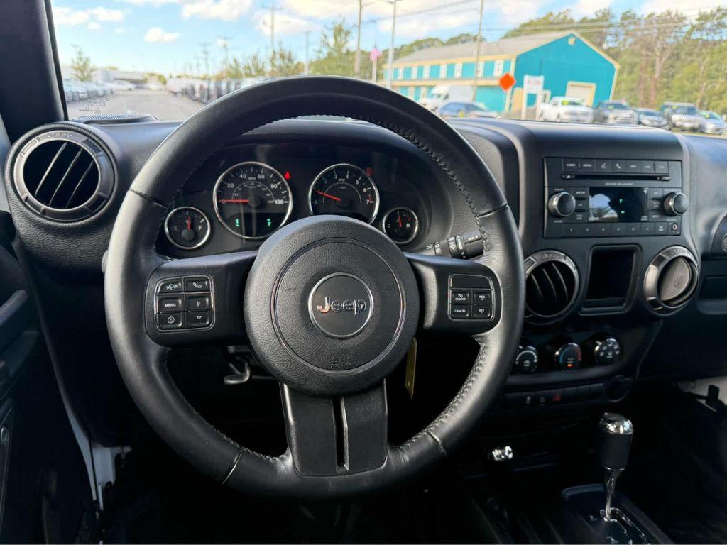 used 2018 Jeep Wrangler JK Unlimited car, priced at $23,975