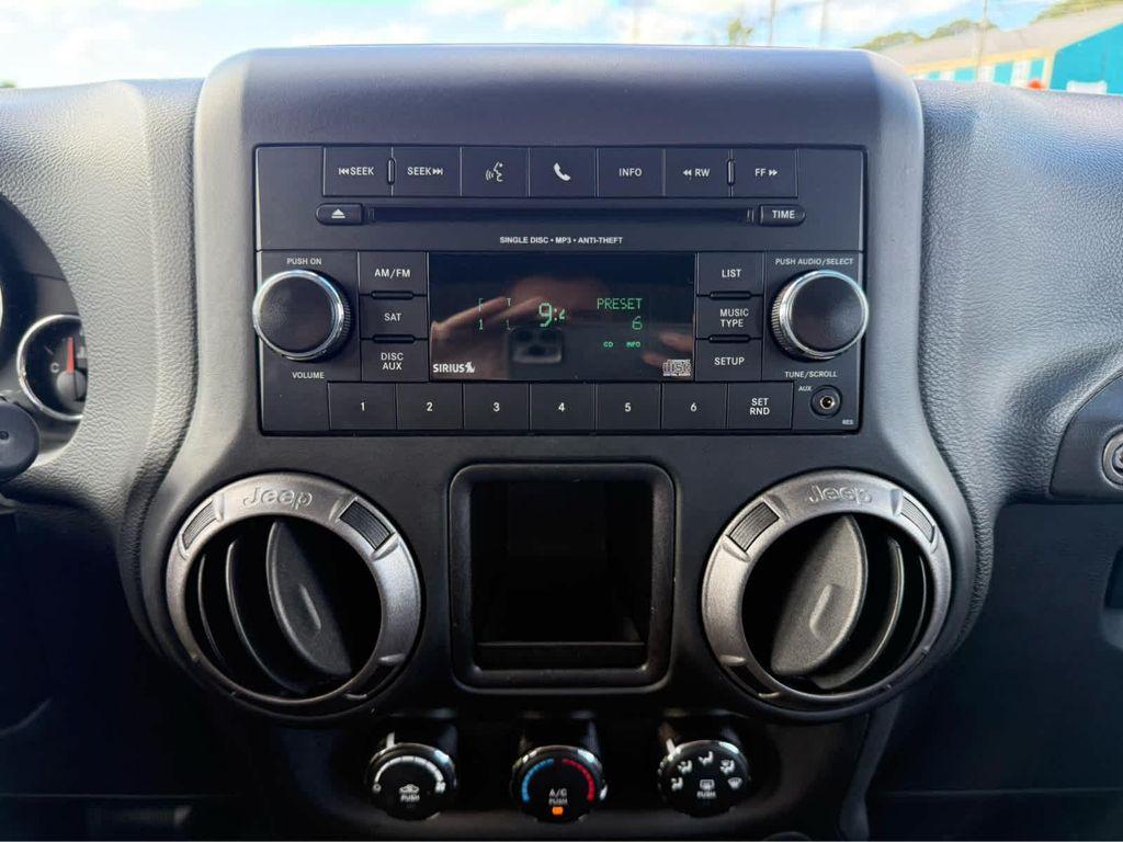 used 2018 Jeep Wrangler JK Unlimited car, priced at $23,975
