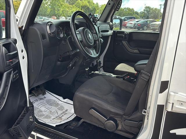 used 2015 Jeep Wrangler Unlimited car, priced at $16,295