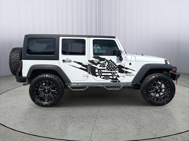 used 2015 Jeep Wrangler Unlimited car, priced at $16,295