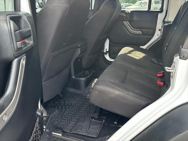 used 2015 Jeep Wrangler Unlimited car, priced at $16,295