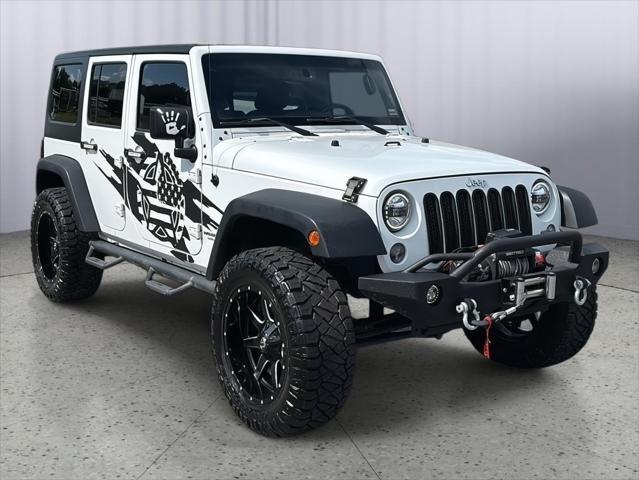 used 2015 Jeep Wrangler Unlimited car, priced at $16,295