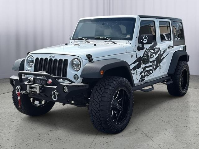 used 2015 Jeep Wrangler Unlimited car, priced at $16,295