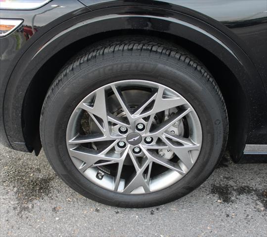 used 2024 Genesis GV70 car, priced at $44,957