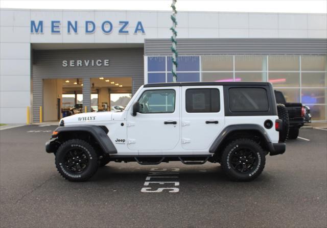 used 2021 Jeep Wrangler Unlimited car, priced at $29,957