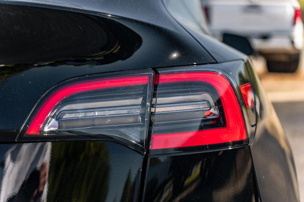 used 2021 Tesla Model Y car, priced at $27,900