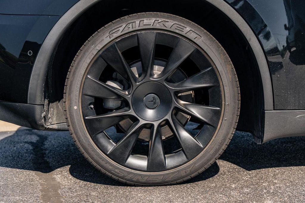 used 2021 Tesla Model Y car, priced at $27,900