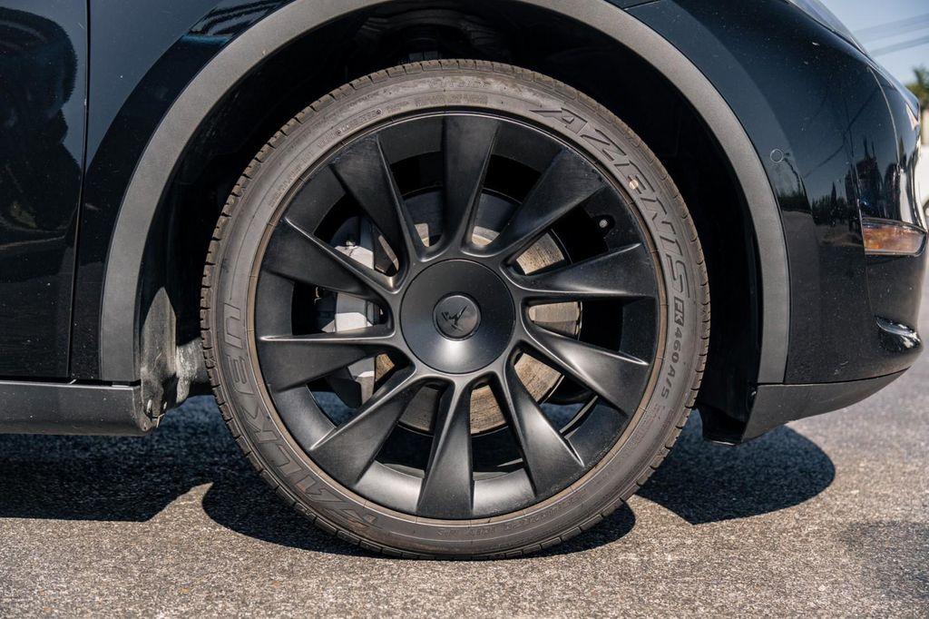 used 2021 Tesla Model Y car, priced at $27,900