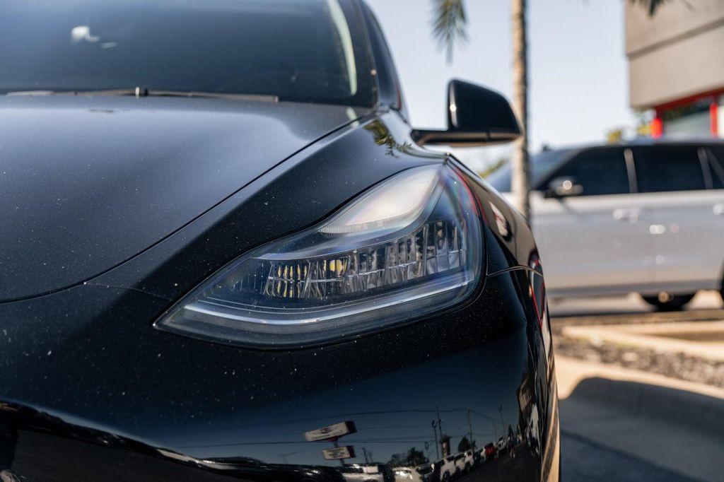 used 2021 Tesla Model Y car, priced at $27,900