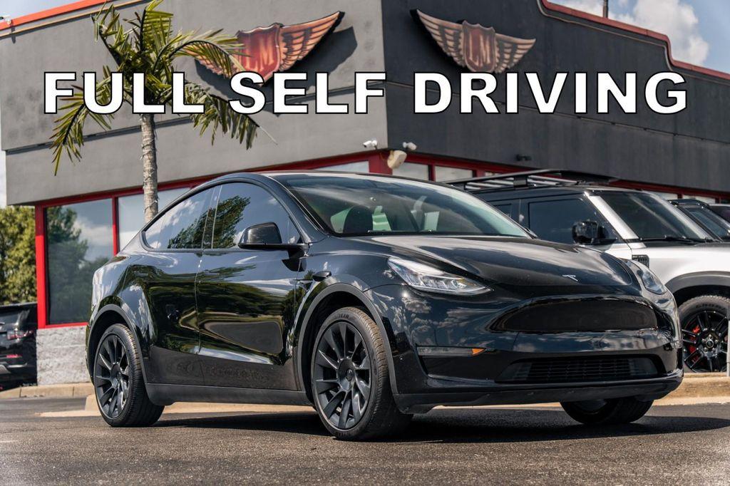 used 2023 Tesla Model Y car, priced at $27,900