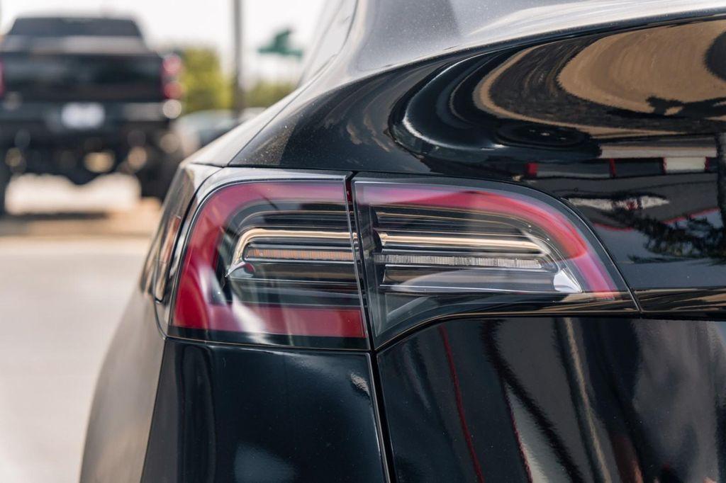 used 2023 Tesla Model Y car, priced at $32,900