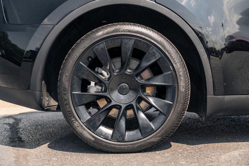 used 2023 Tesla Model Y car, priced at $32,900