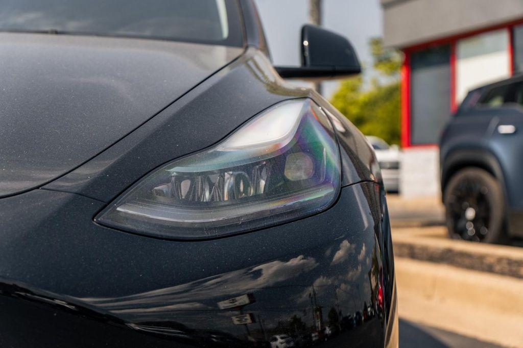used 2023 Tesla Model Y car, priced at $32,900