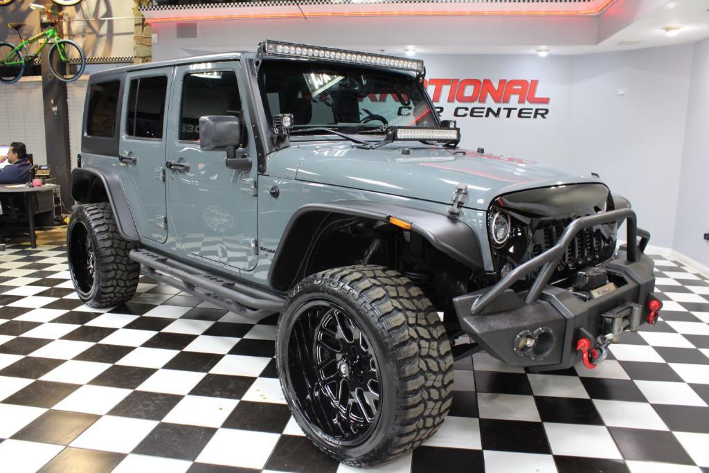 used 2014 Jeep Wrangler Unlimited car, priced at $19,890