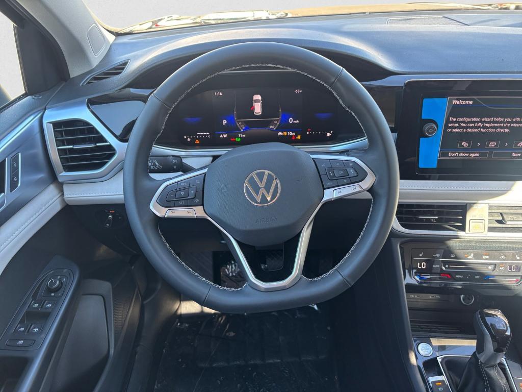 new 2025 Volkswagen Taos car, priced at $27,216